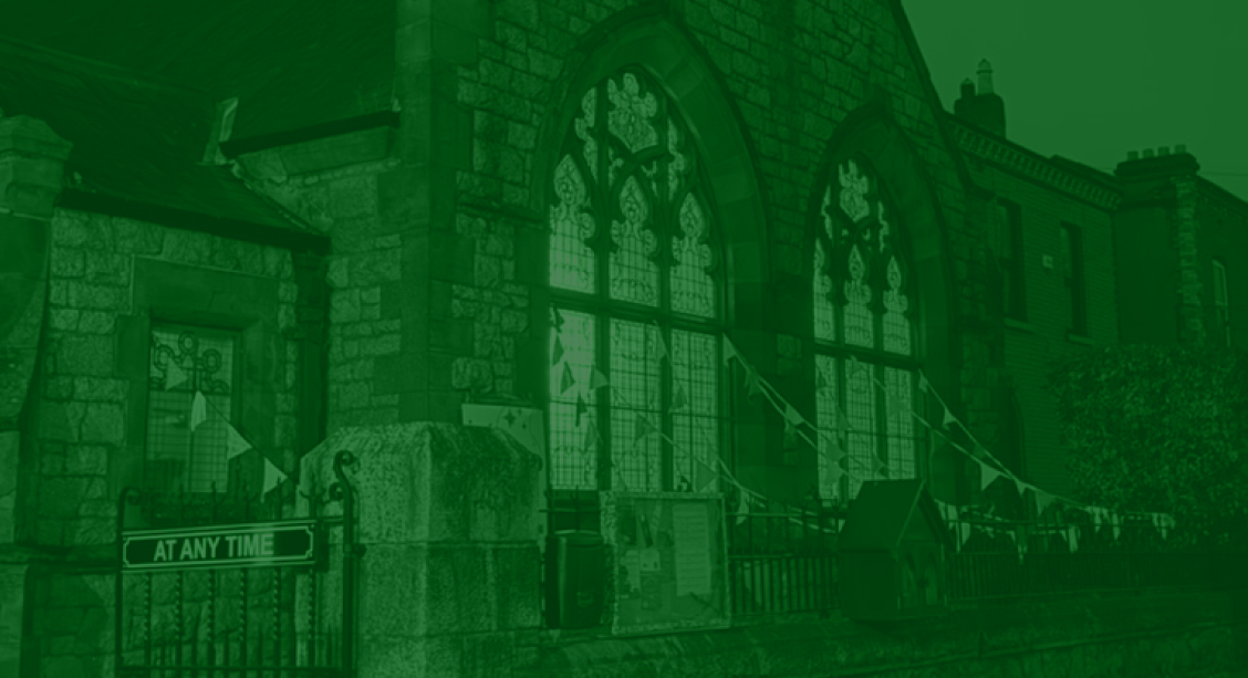 A photo of ornate windows of the Portobello Community Hall from the outside